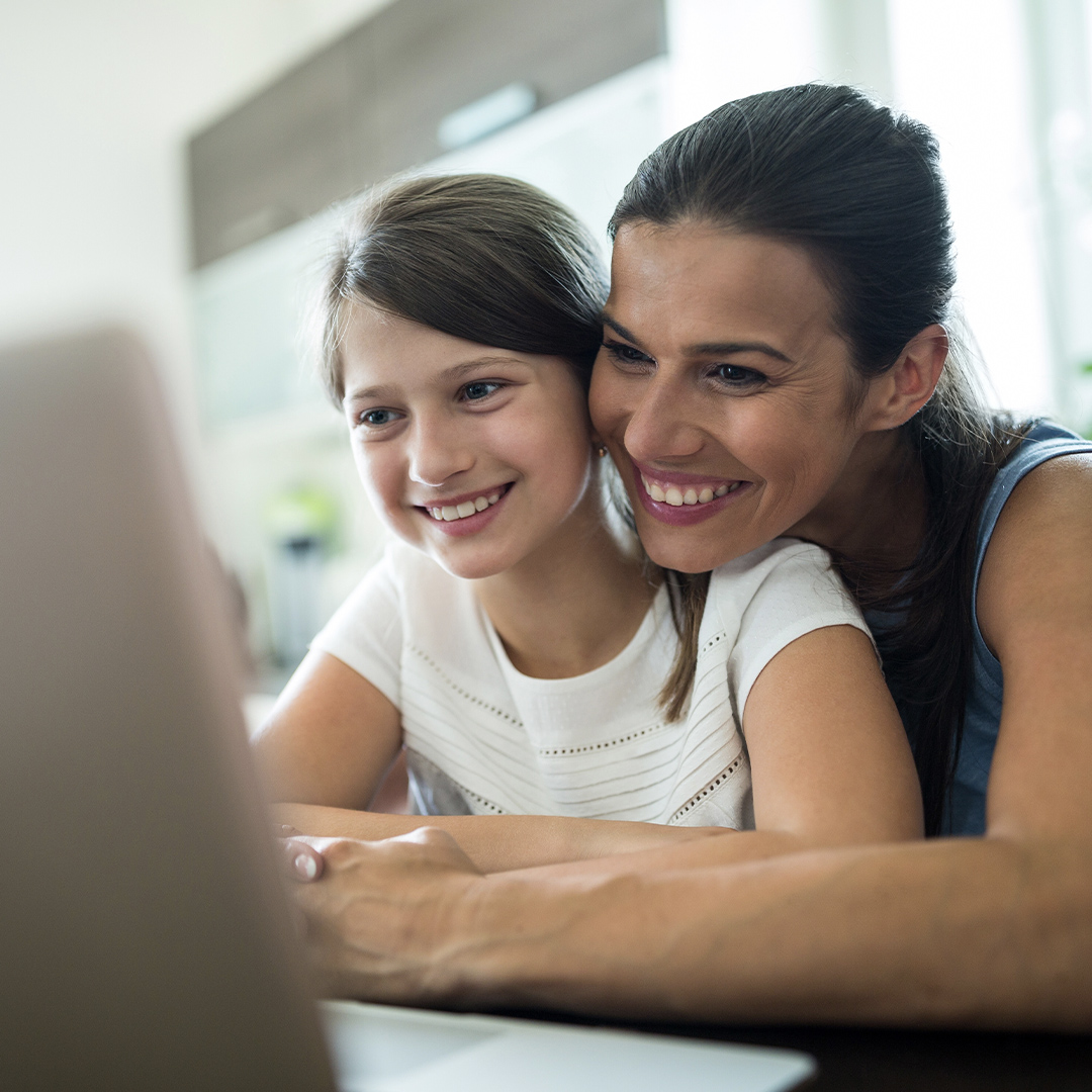 Mother and daughter scheduling an appointment online at Loudoun Innovative Dentistry